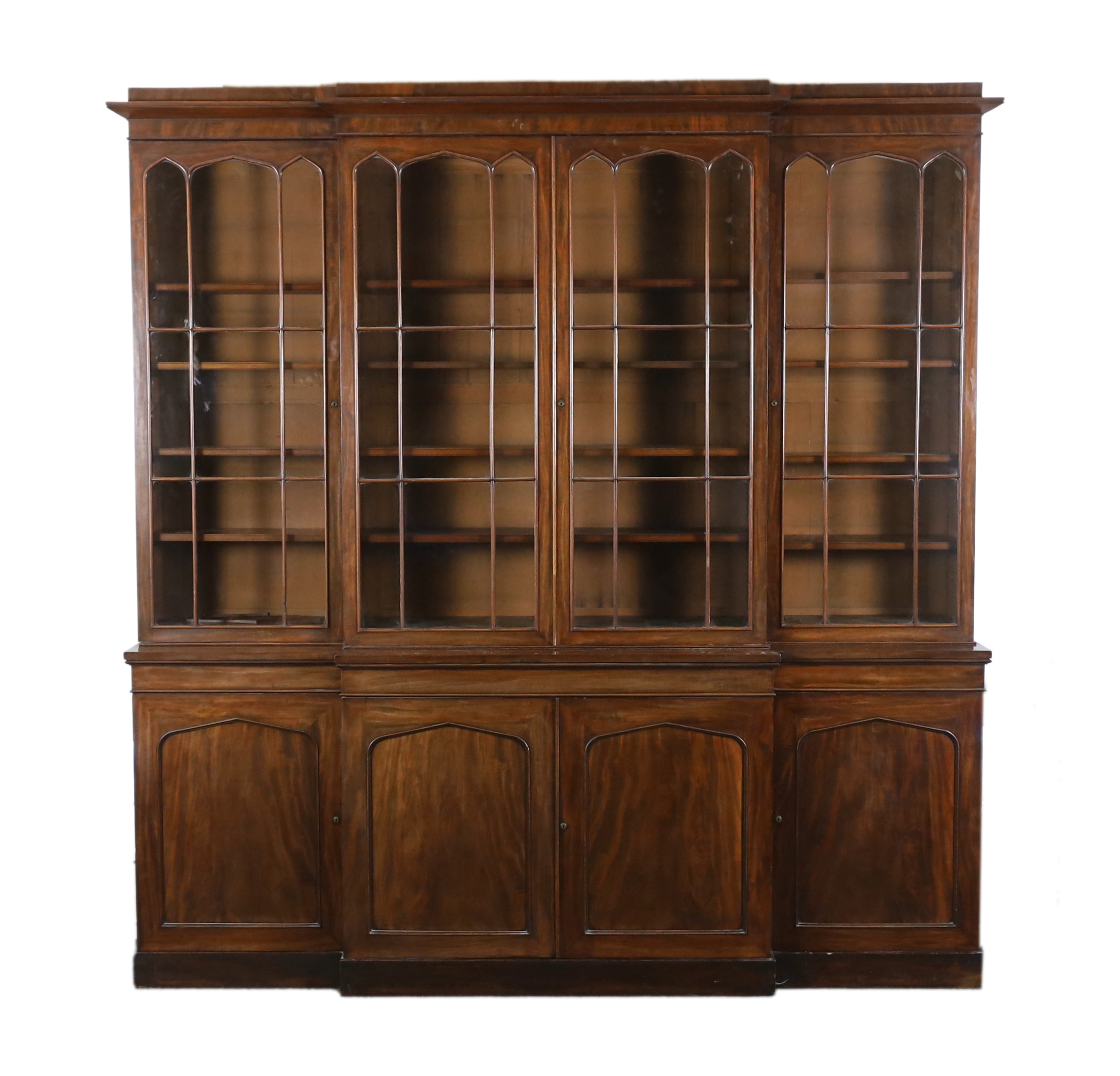 An early Victorian mahogany breakfront library bookcase